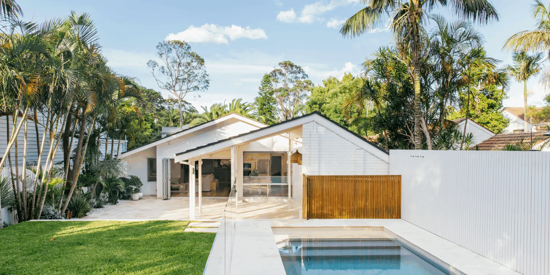 Modern home opening onto an outdoor pool